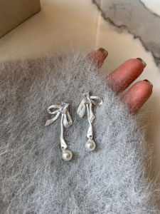 CAFFTI | Silver Filigree Tassel Bow Pearl Earrings