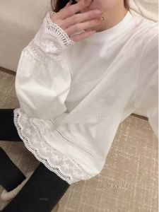 เสื้อยืดคอกลมแขนยาวลายปักสีพื้นทรงหลวมสไตล์เรียบง่ายสำหรับผู้หญิงในฤดูใบไม้ร่วงและฤดูหนาว