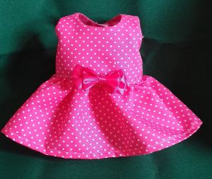 Pink/red/coral/blue polka dot baby doll dress with bow for 11 to 12 inch dolls.