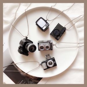 Miniature เกาหลีต้นฉบับ ดีไซน์ สร้อยคอเรืองแสงกระพริบกล้องจี้การผลิตเสียง < Ne1> เครื่องประดับสําหรับคู่รัก