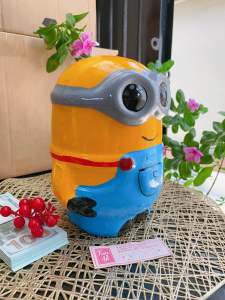 Heo đất (ống tiết kiệm) hình Minion hàng sơn bóng mịn hình vẽ tay sắc nét ship hoả tốc HCM
