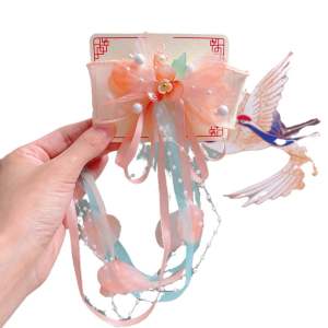 Kẹp tóc nơ cổ trang tua hạt cho bé