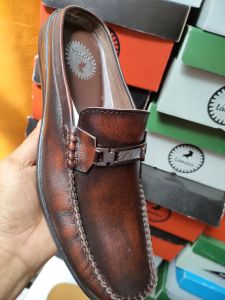 bustomg kulit sapi asli