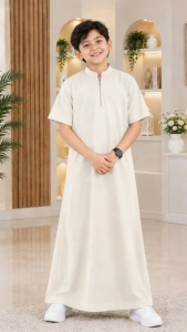 Navy blue traditional long Jubah with zipper collar for men and boys. Casual wear for home or family outings. Matching outfits in a modern living room setting.