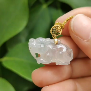 Crafted as Pixiu Icy Translucent Natural Type-A Jadeite-Jade set with 18k Gold Clasp as Pendant certificate weighs 3.4 grams measurement 24.3 * 13.6 * 5.9 mm (18kp66)
