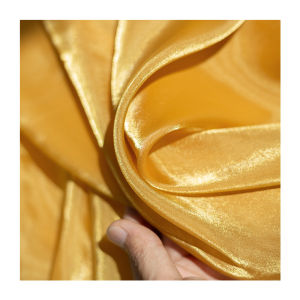 ผ้าชีฟองโอเกอเนียสีเหลืองทองเนื้อนุ่มบางใสเคลือบเงาสำหรับผ้าชุดราตรี ผ้าสำหรับตกแต่งบ้าน ผ้าสำหรับทำเสื้อผ้า DIY