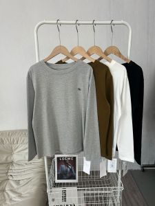 เสื้อยืดคอกลมแขนยาวผ้าฝ้ายสีขาวสำหรับผู้หญิง ทรงหลวมสบายๆ ลำลอง ฤดูใบไม้ผลิและฤดูใบไม้ร่วง เสื้อชั้นในสีพื้น