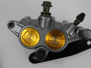 Motorcycle Brake Caliper 2-Pot alloy brake caliper for Honda Wave 110/125. Plug and Play installation. Multiple colors available.
