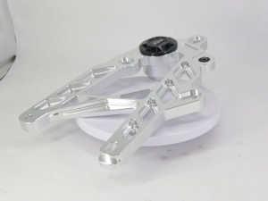 Motorcycle Fun Times Rear Swingarm CNC Process High Quality Silver Metal Component with Black Circular Element and Included Hardware