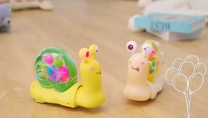 ProudNada Toys ของเล่นเด็ก หอยทาก ชนถอย(มี 2 สีให้เลือก) TRANSPARENT TOY GEAR SNAIL NO.CL201A