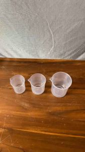 GELAS UKUR PLASTIK | GELAS TAKAR SIRUP