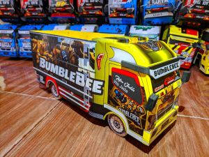 PROMOO MAINAN ANAK TRUK OLENG KAYU BUMBLE BEE DI LENGKAPI  LAMPU TERPAL DAN REMOTE CONTROL TERLARIS