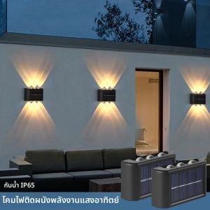 โคมไฟติดผนังพลังงานแสงอาทิตย์กลางแจ้งกันน้ำพลังงานแสงอาทิตย์ขึ้นและลงส่องสว่างบ้านสวนลานตกแต่งแสงแดดภายนอก