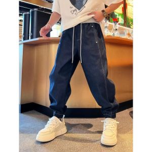กางเกงยีนส์ทรงหลวมสำหรับผู้ชายในช่วงฤดูใบไม้ผลิและฤดูใบไม้ร่วง กางเกงขายาวทรงหลวมเอวยางยืด ทรงหลวม ทรงหลวม ทรงหลวม