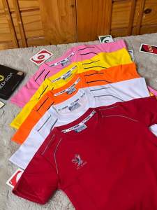 เสื้อกีฬาเด็กกลอกลมFLY HAWKรุ่นC970เป็นผ้าระบายความร้อนได้ดี