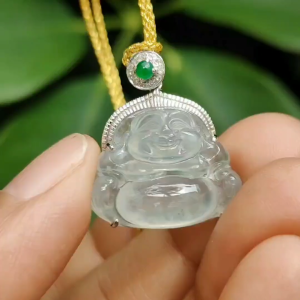 Crafted as Milo Buddha on High-Quality Icy Translucent Natural Type-A Jadeite-Jade set on 18k Gold as Pendant certificate weighs 3.85 grams measurement 21.8 * 19.9 * 8.2 grams (18kp65)