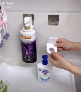 Giá Đỡ Cổ Chai Dầu Gội Sữa Tắm Dán Tường Tiện Dụng