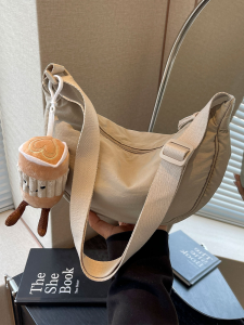 Casual Dumpling Shaped Canvas Bag Lightweight Single Shoulder Crossbody Bag for Women Simple Stylish New 2026 Pure Color Bag