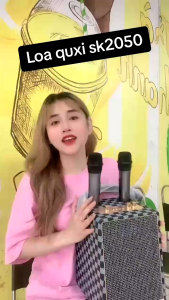 Loa bluetooth karaoke qixi sk-2050 kèm 2 micro không dây âm thanh mạnh mẽ pin lâu dễ di chuyển.