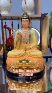 Tượng Quan Âm Bồ Tát Ngồi đài sen vàng áo rũ màu đỏ và màu vàng