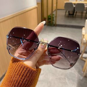 New 2025 round Sunglasses Womens No Frame Edge Cut Ultraviolet Protection Slimming Large Face Glasses Fashionable Elegant