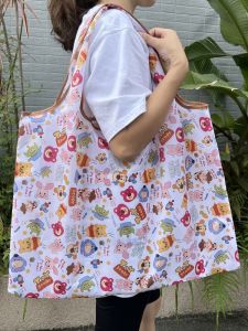 กระเป๋าซีรีส์การ์ตูนยักษ์ขนาดใหญ่ ที่ปรับปรุงใหม่ในปี 2021 กระเป๋าใส่ของใช้ในครัวเรือนแบบพับได้ กระเป๋าเดินทางแบบพกพา