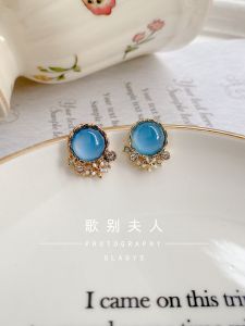 ต่างหูแบบหนีบต่างหูตาแมวสีฟ้าดูแพงดูแพงแนววินเทจดีไซน์ออริจินอลสีฟ้าอ่อนโยนสำหรับสุภาพสตรียี่ห้อ Song Bei