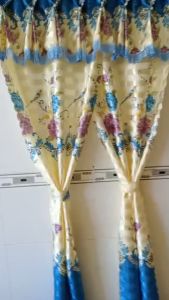Rèm cửa phòng khách  BENU STORES  chất liệu phi bóng  01 mặt màu xanh dương họa tiết con chim sáng bóng ép biên sang trọng đẹp mắt