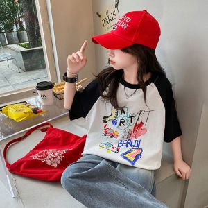 Pure ผ้าฝ้าย เสื้อยืดแขนสั้นสําหรับเด็กผู้หญิง ฤดูร้อน 2024 ใหม่ สไตล์เกาหลี แฟชั่นเย็บปะติดปะต่อกัน เสื้อท่อนบน เด็ก หลวม ครึ่งแขน