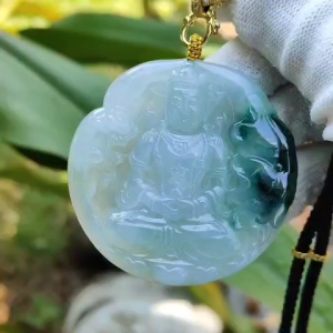 Very Rare Old Mine Myanmar Natural Type A Jadeite Pendant carved as Du Mu with a weigh at 181.11 grams measurements at 55 * 55.158 * 6.96 mm - Translucent near colorless with patches of green and deep green with good translucency (pendant153)