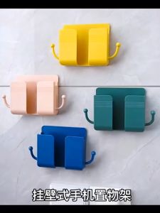 BUJOY ขาตั้งโทรศัพท์ติดผนัง ที่วางรีโมท ตะขอสองด้าน เก็บโทรศัพท์มือถือ นํากระดาษกาวมาเอง กล่องใส่รีโมทติดผนัง ไม่ต้องเจาะ