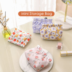 คลิปวิดที่น่ารัก: กระเป๋าใส่เหรียญที่เก็บหูฟังและกระเป๋ากุญแจพิมพ์ลายเศษ กระสุน