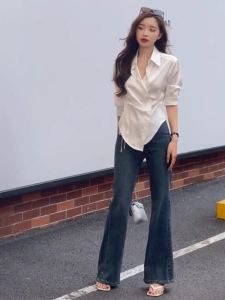 เสื้อเชิ้ตแขนยาวสไตล์ฝรั่งเศสสำหรับผู้หญิง ฤดูใบไม้ผลิและฤดูใบไม้ร่วง เสื้อเชิ้ตทรงเข้ารูปไม่สมมาตรดีไซน์ไม่ซ้ำใคร ทรงหลวมๆ สไตล์ลำลอง เสื้อเชิ้ตกระชับสัดส่วน