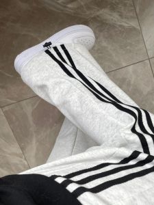 กางเกงกีฬาผู้หญิงทรงหลวมเอวสูง 3 แถบ กางเกงขายาวทรงหลวม ผ้าฝ้ายผสมโพลีเอสเตอร์ ฤดูใบไม้ผลิและฤดูใบไม้ร่วง