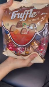 TRUFFLE BAG 500G MILKY CHOCOLATE WITH CRISPED RICE FILING AND HAZELNUT STRAWBERRY COCONUT CARAMEL CREAM
