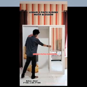 Lemari pakaian 3 Pintu sliding Motif HEXA. Bahan plat besi. Brand Olympic. Lemari baju wardrobe cermin gantungan brangkas. Anti Rayap anti basah.