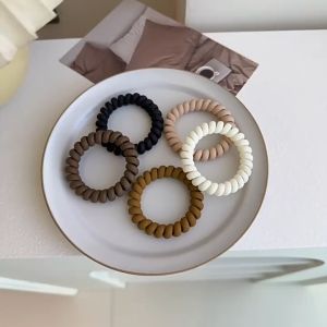 Dây cột tóc lò xo dạng xoắn màu trơn phong cách hàn quốc CT40