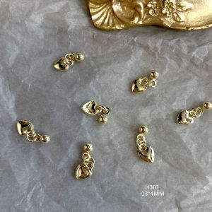 Y2K เครื่องประดับเล็กโลหะสไตล์ปังสีสันสดใส Starburst หัวเข็มขัดหัวใจรูปห้าแฉกตกแต่งเล็บ เครื่องประดับเล็บ แหล่งกำเนิดจีน