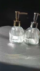 ขวดแก้วหัวปั้มแก้วใส หัวปั้มสแตนเลสสีเงิน สีทอง ขนาด 200ml.No.3757