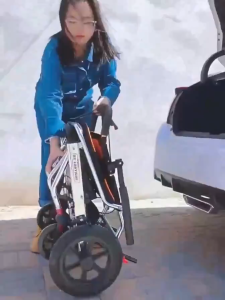 Multifunctional folding wheelchair aluminum alloy wheelchair light folding adult wheelchair travel portable simple trolley weighs 200kg and can be taken on the plane