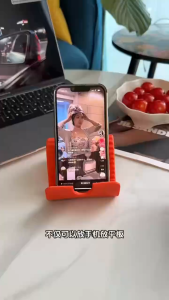 ✅2026 NEW✅JOMO Rollable Silicone Phone Stand Foldable Hanging Charging Supported Anti Slip Portable Holder