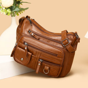 Womens crossbody bag synthetic leather shoulder bag with adjustable shoulder straps lightweight multi pocket bag with zipper