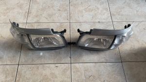 LAMPU DEPAN HEAD LAMP HEADLAMP LAMPU UTAMA TOYOTA DYNA SAURUS DYNASAURUS HT130 HT 130 HINO DUTRO ORIGINAL MERK DMAC D-MAC D MAC KIRI / KANAN HARGA SATUAN