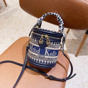 Luxury Leather Bucket Bag Womens Crossbody Bag Trendy Small Luxury Handbag Soft Handle Embroidered Detail Hard Shell Water Bucket Bag