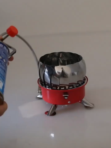 Bếp gas mini gấp gọn du lịch dã ngoại CÓ CHẮN GIÓ và dây dẫn nhỏ gọn dễ dàng mang theo bên người [ LOẠI CAO CẤP CÓ DÂY NỐI 2025]