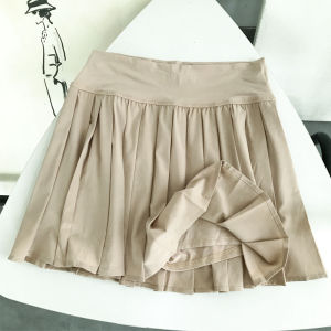 กระโปรงเทนนิสความยืดหยุ่นสูงแห้งเร็วสําหรับผู้หญิงกางเกงขาสั้นวิ่งครึ่งความยาวแบบสปอร์ตพร้อมการดูดซับความชื้นและป้องกันรังสียูวี