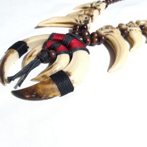 Kalung Sepasang Taring Variasi Kuku Macan Kalung Dayak Kalimantan Kalung Etnik Taring