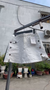 Chân váy chữ a đính hàng nút trước cá tính có bảo hộ váy giả quần