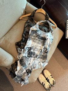 GUZILIAN | Áo vest cổ treo in báo Mỹ cổ điển thời trang mùa hè mới có đệm ngực không đối xứng thắt lưng thời trang áo trên