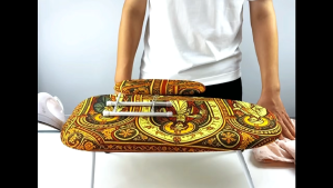 Foldable ironing board garment steamer table mat holder